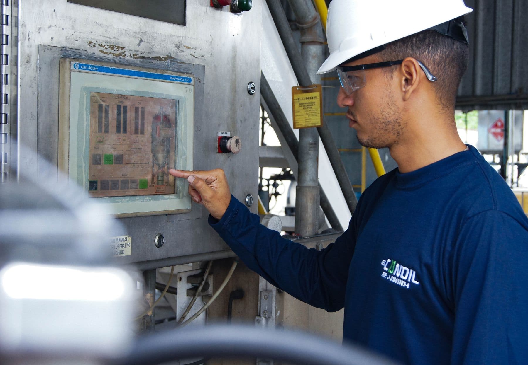 Engineer at control panel — stock photograph